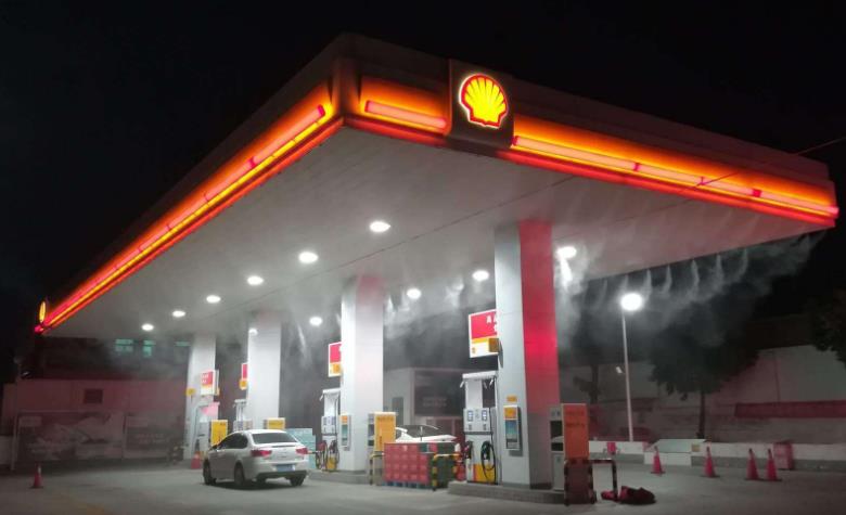 Gas station atomizing spray cooling